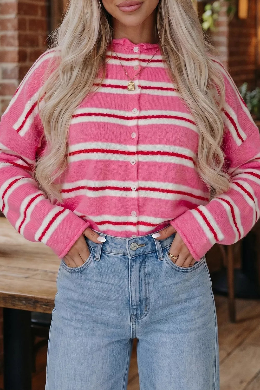Striped knit button-front cardigan with rolled crew neck