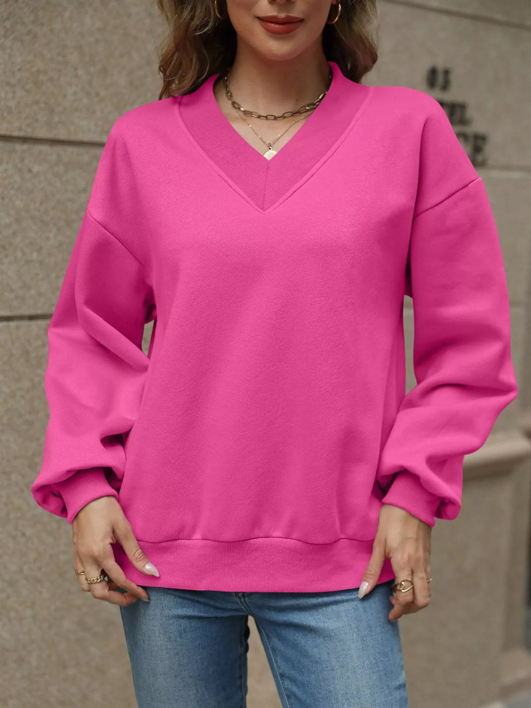 V-neck drop-shoulder pullover sweatshirt with ribbed trim