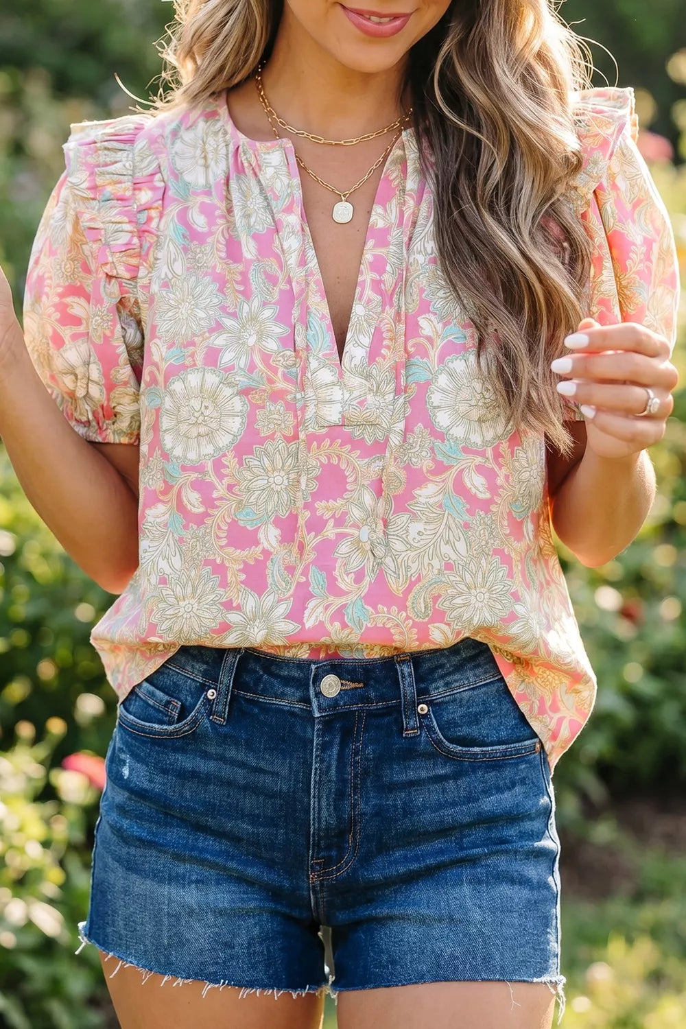 Floral puff sleeve blouse with ruffle shoulder and split neck