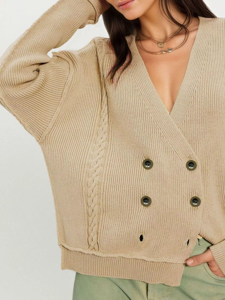 Double-breasted cable knit cardigan with raw hem