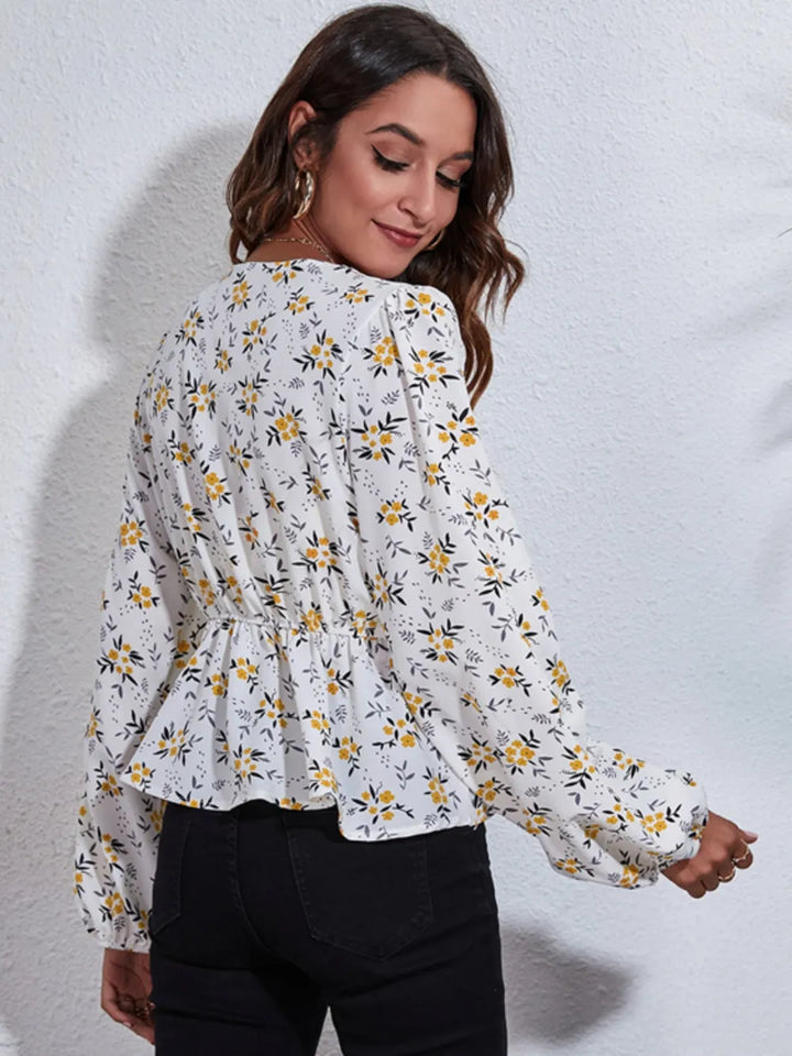 Balloon sleeve floral v-neck peplum blouse