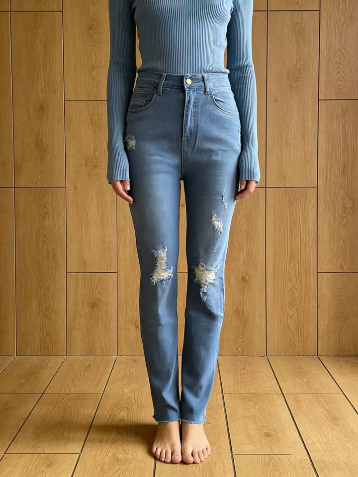 Distressed high-rise skinny jeans with frayed hem