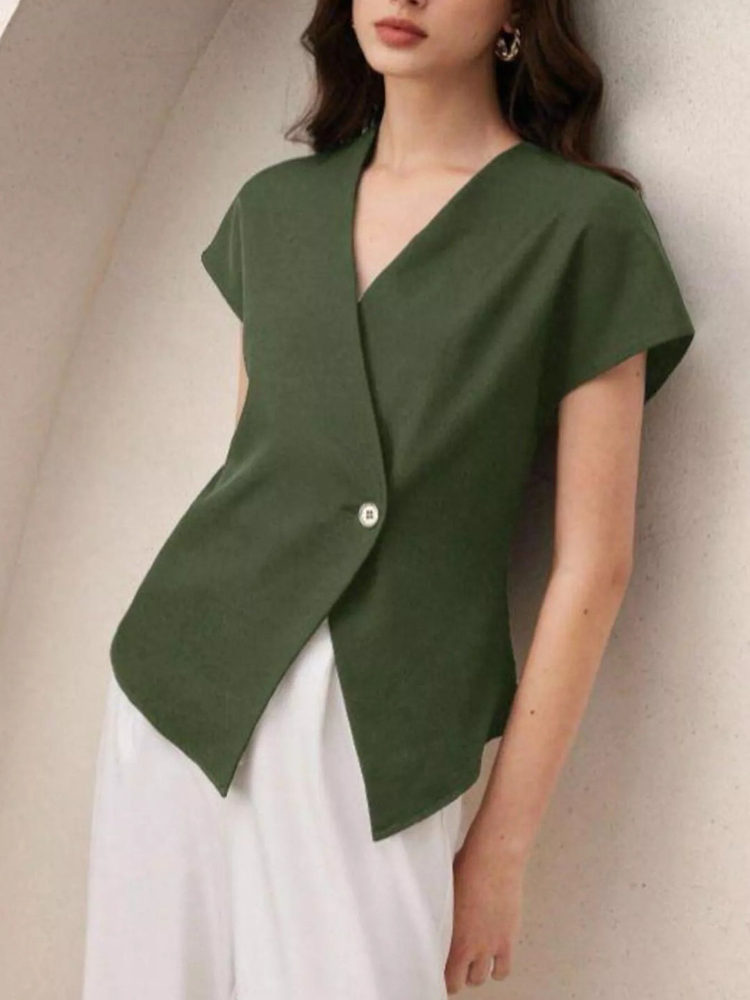 Wrap-front cap sleeve blouse with single wooden button