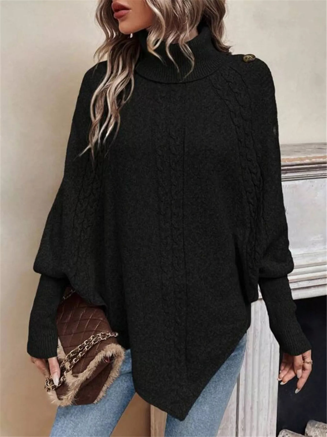 Cable knit turtleneck cape sweater with button shoulder