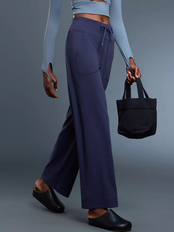 Wide-leg drawstring pants with curved front pockets