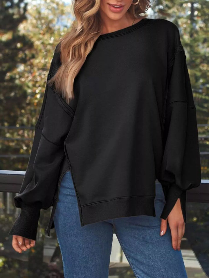Oversized side-slit sweatshirt with exposed seams