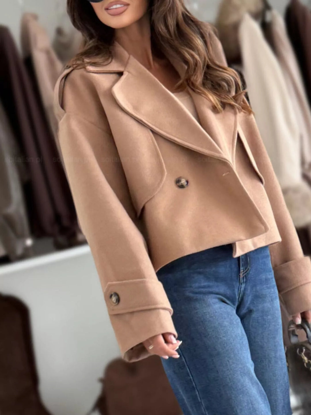 Double-breasted cropped coat with notch lapels and button cuffs