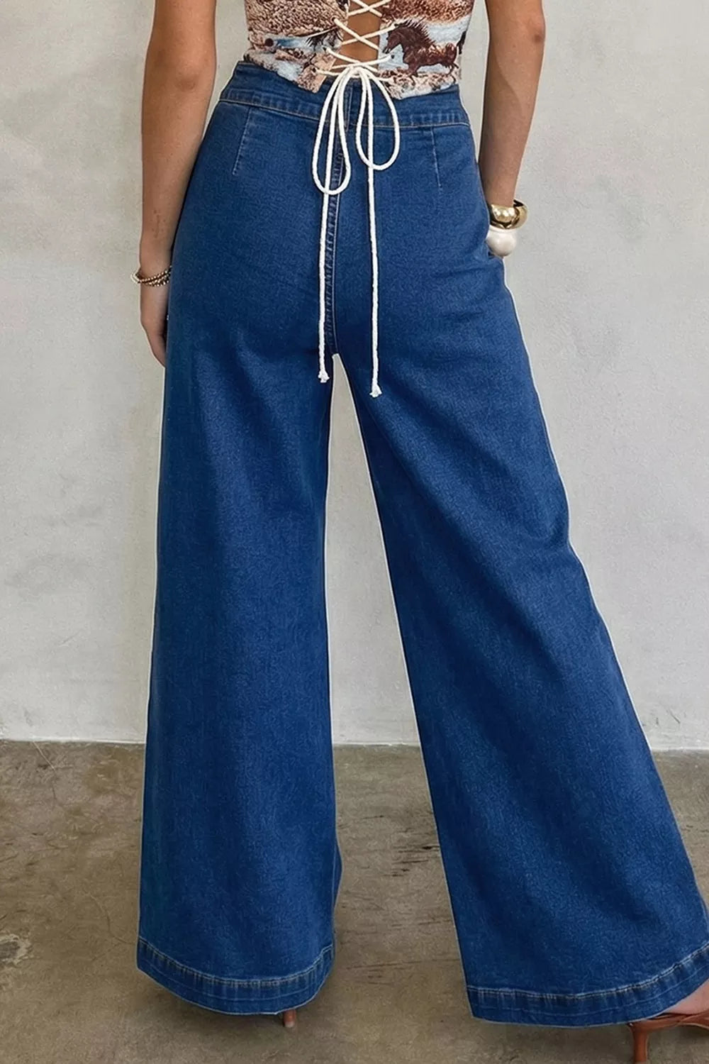 Wide leg jeans with gold bit hardware patch pockets