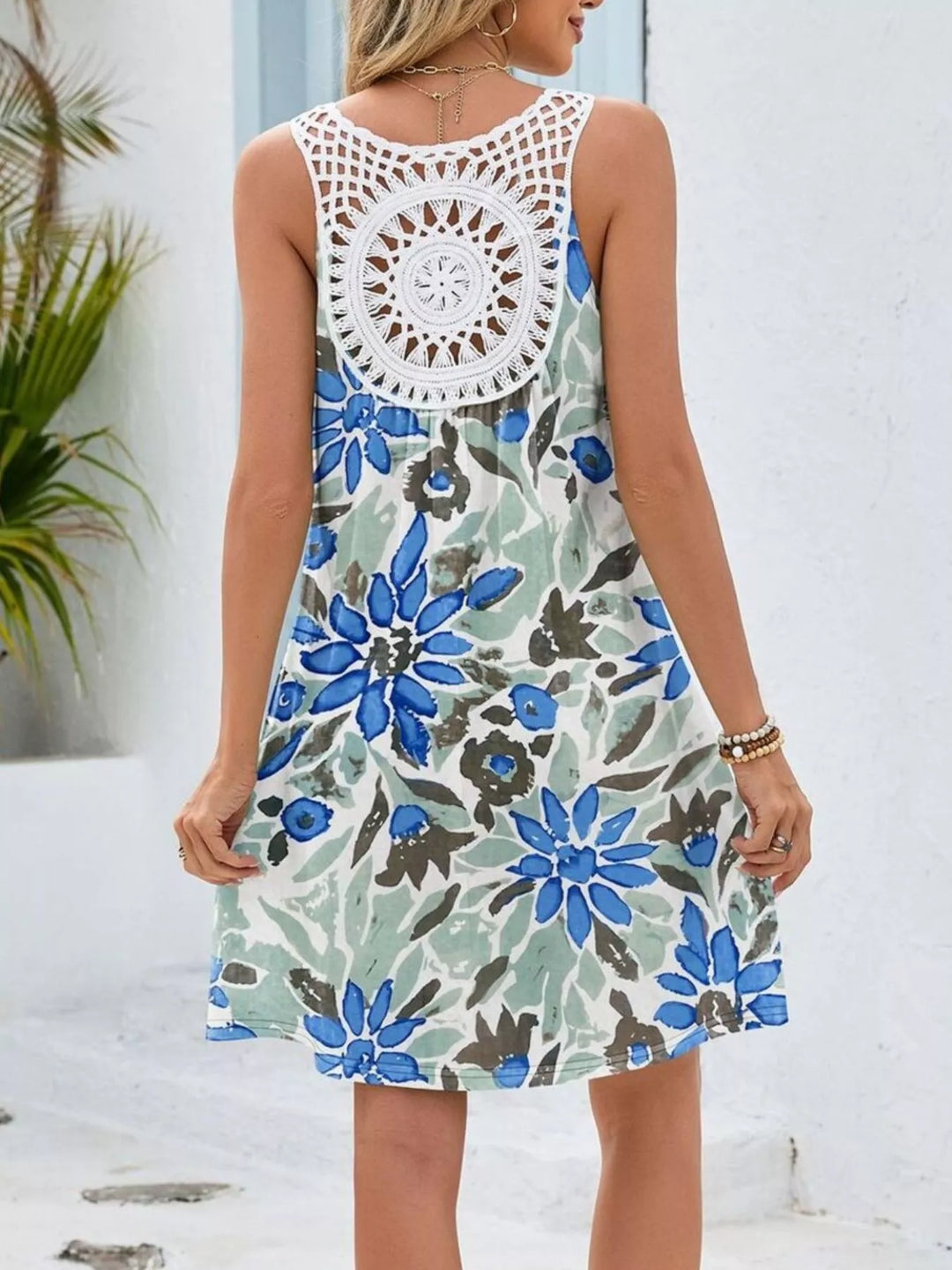 Watercolor floral mini dress with crochet cutout back