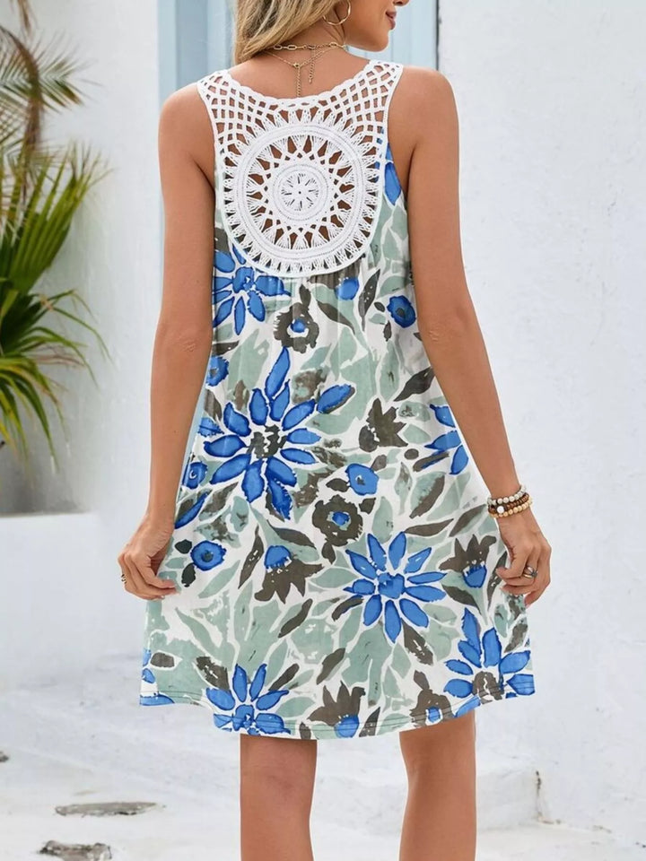 Watercolor floral mini dress with crochet cutout back