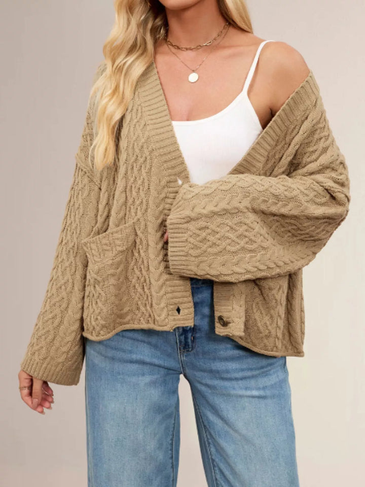 Cable knit button-front cardigan with patch pockets