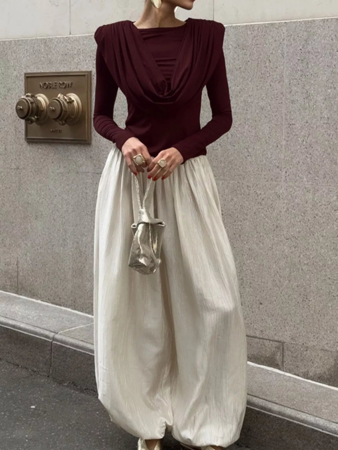 Draped cowl neck long sleeve top with ruched sides