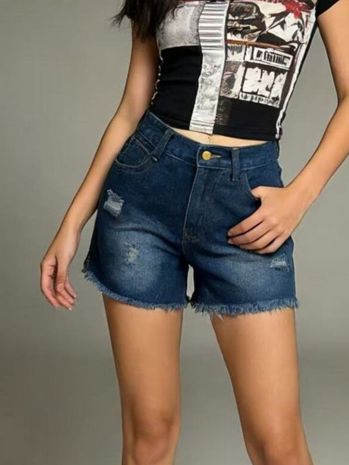 Distressed high-rise denim shorts with frayed raw hem