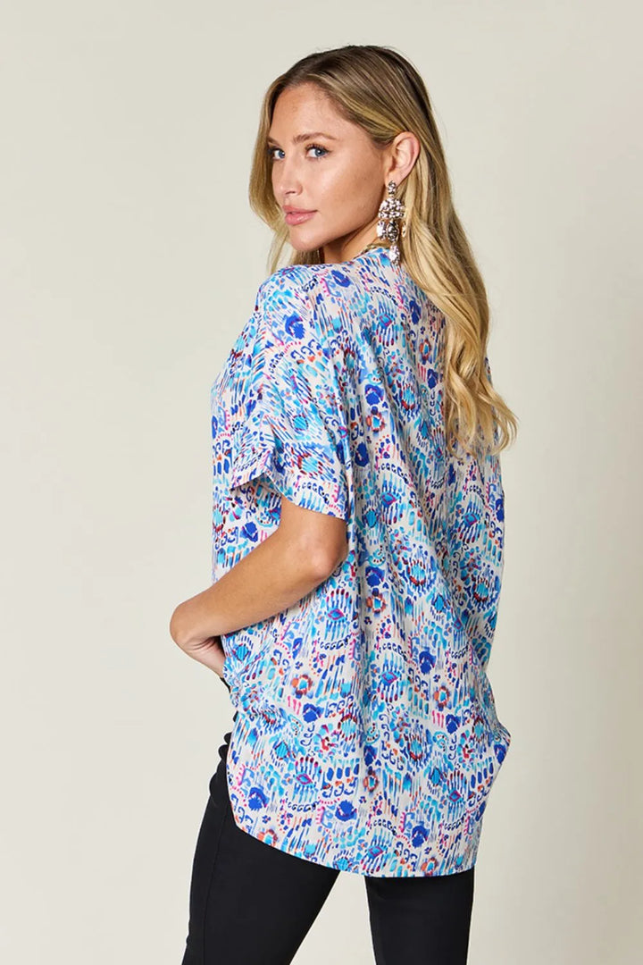 Abstract print V-neck short sleeve tunic blouse