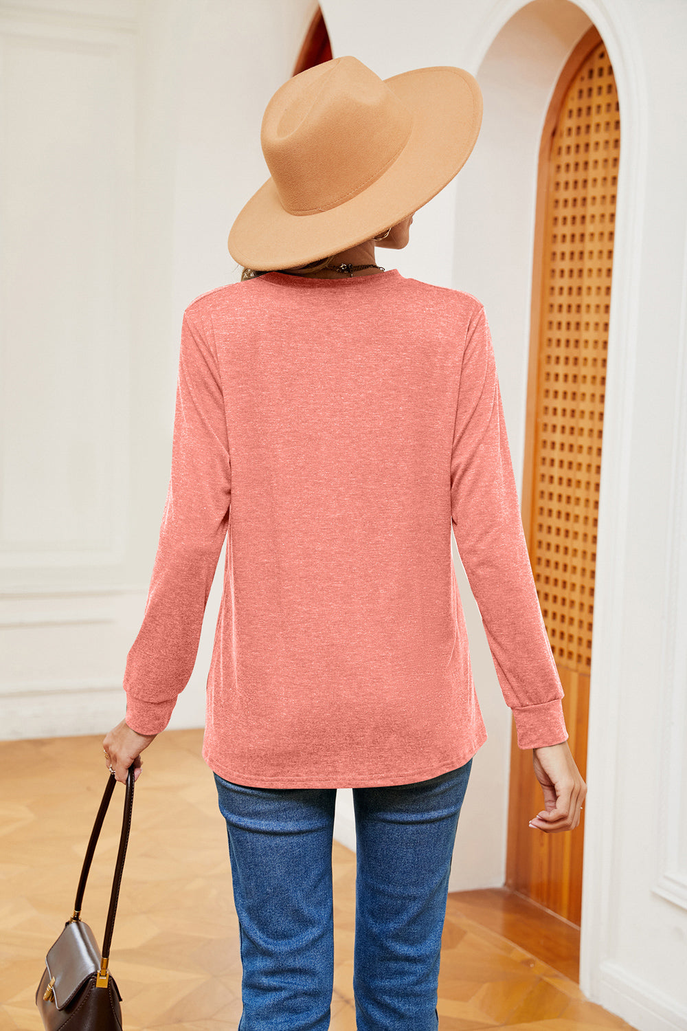 Notch neck long sleeve top with button placket