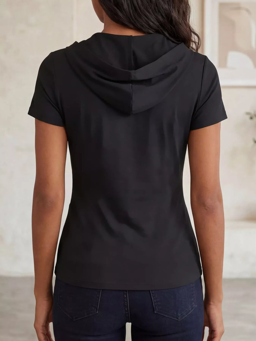 Ruched wrap-front hooded top with asymmetric hem
