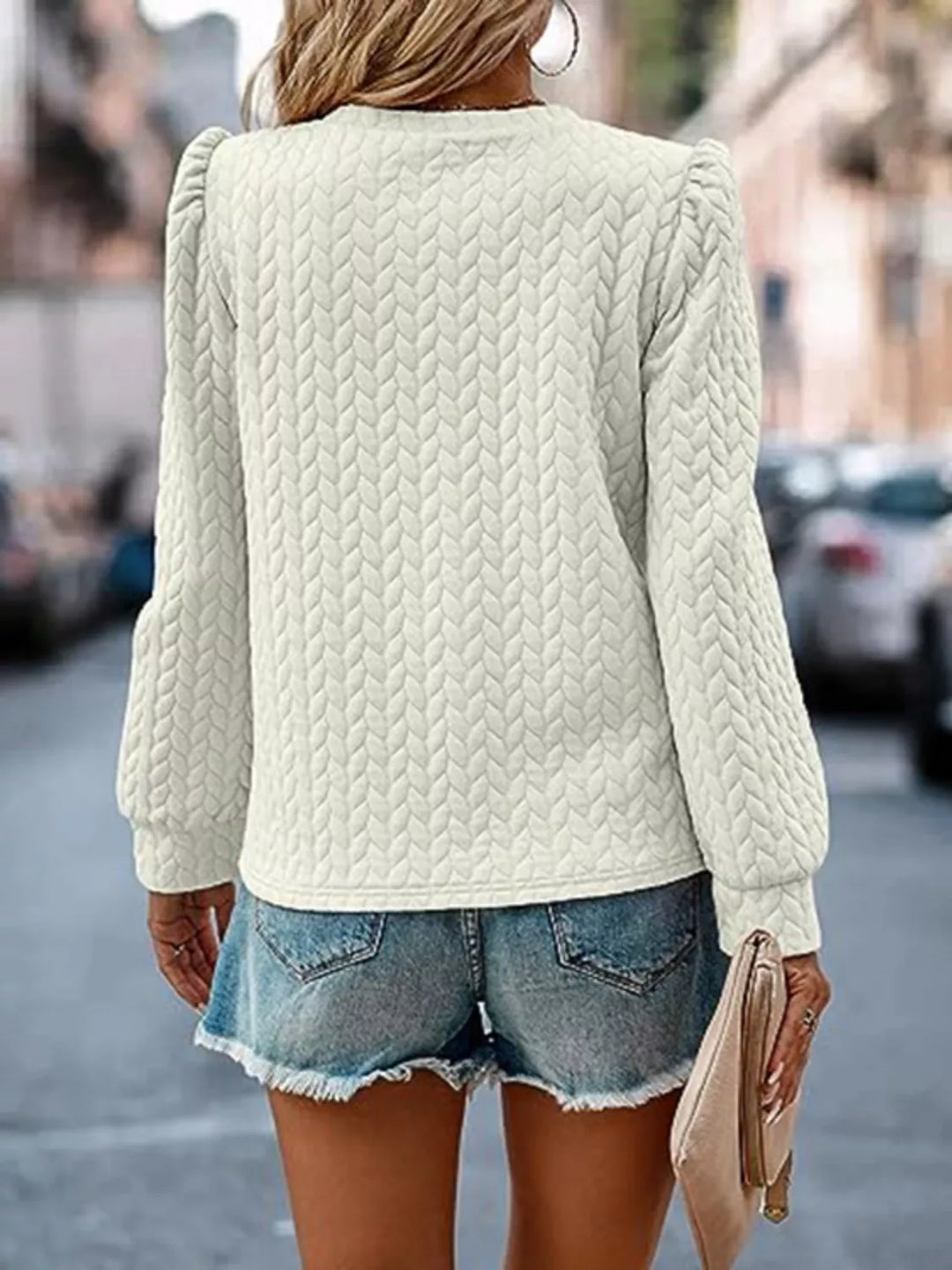 Textured cable-knit puff sleeve pullover top