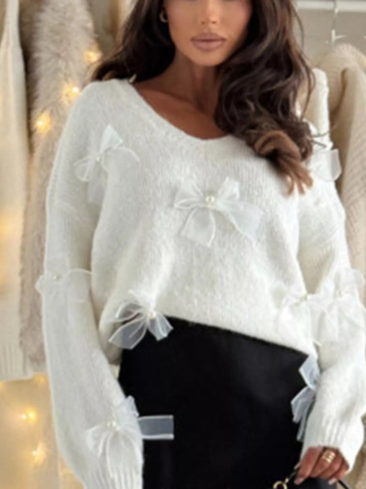 Bow-accented V-neck fuzzy knit sweater with pearls