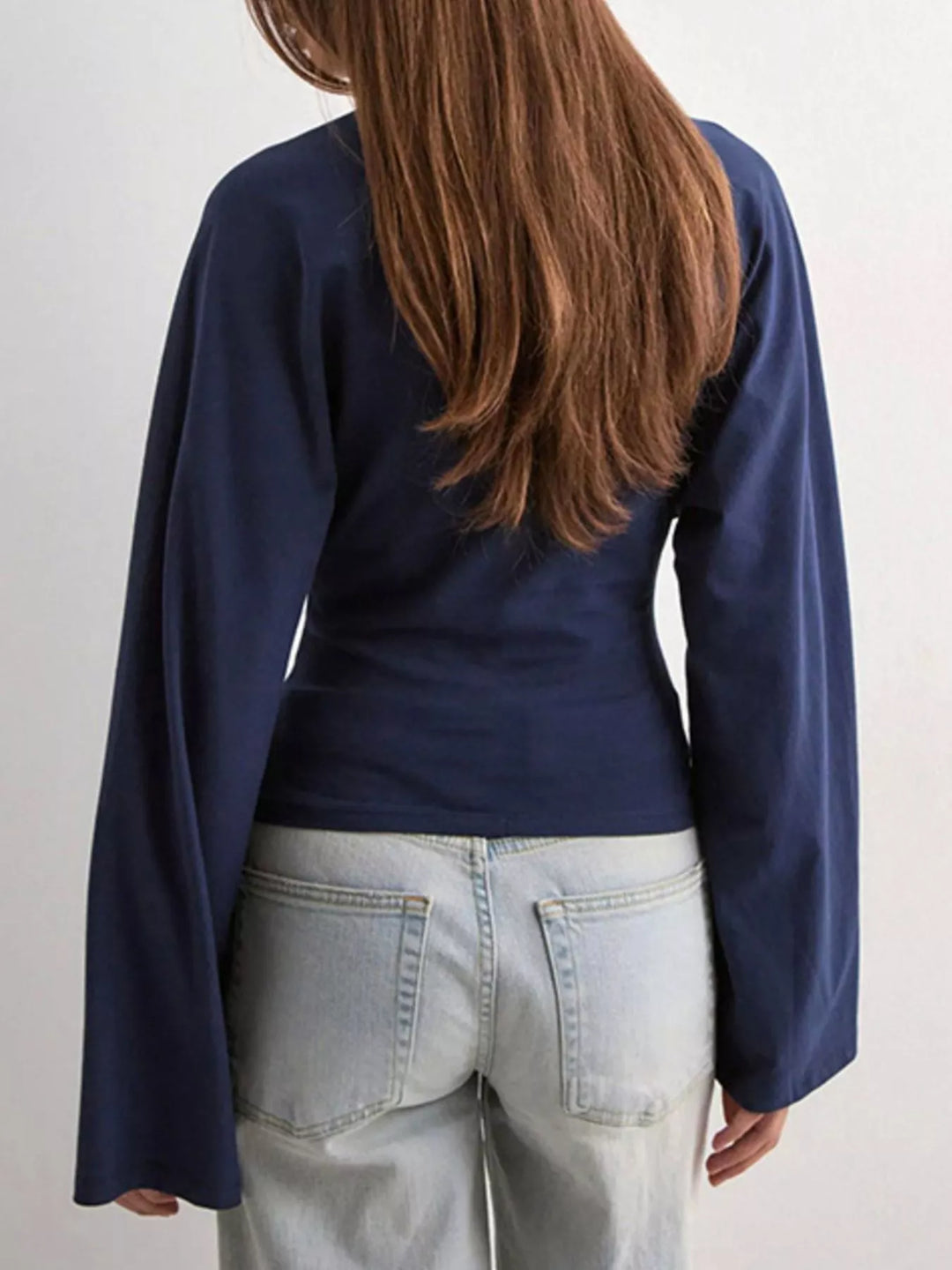 Fitted long sleeve top with flared bell sleeves