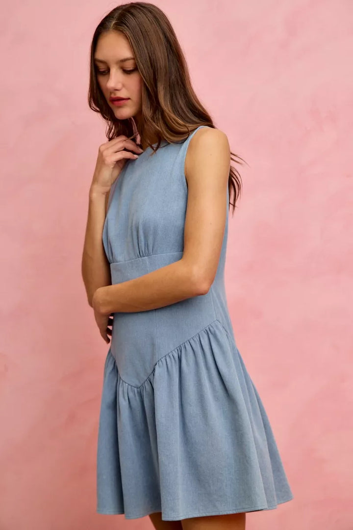 Sleeveless boat neck denim mini dress with flounce hem