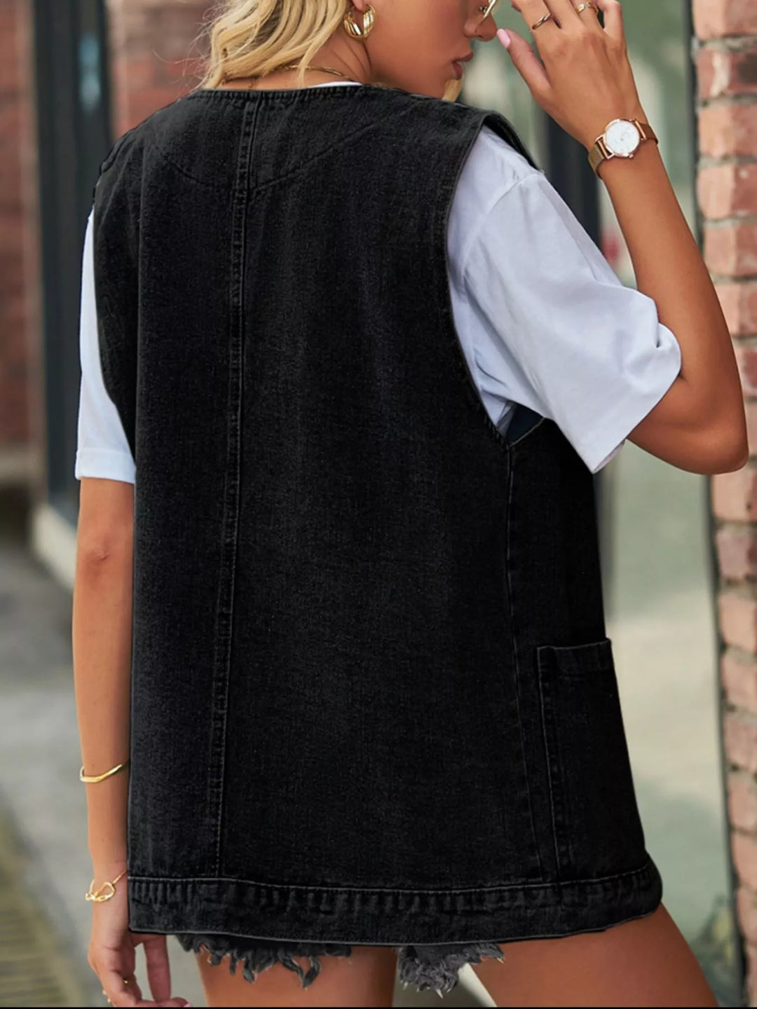 Sleeveless button-down denim vest with patch pockets