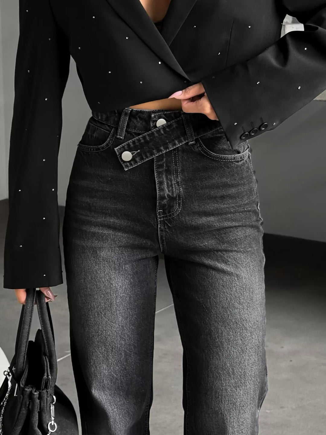 High-rise wide-leg jeans with crossover waistband and slit hem