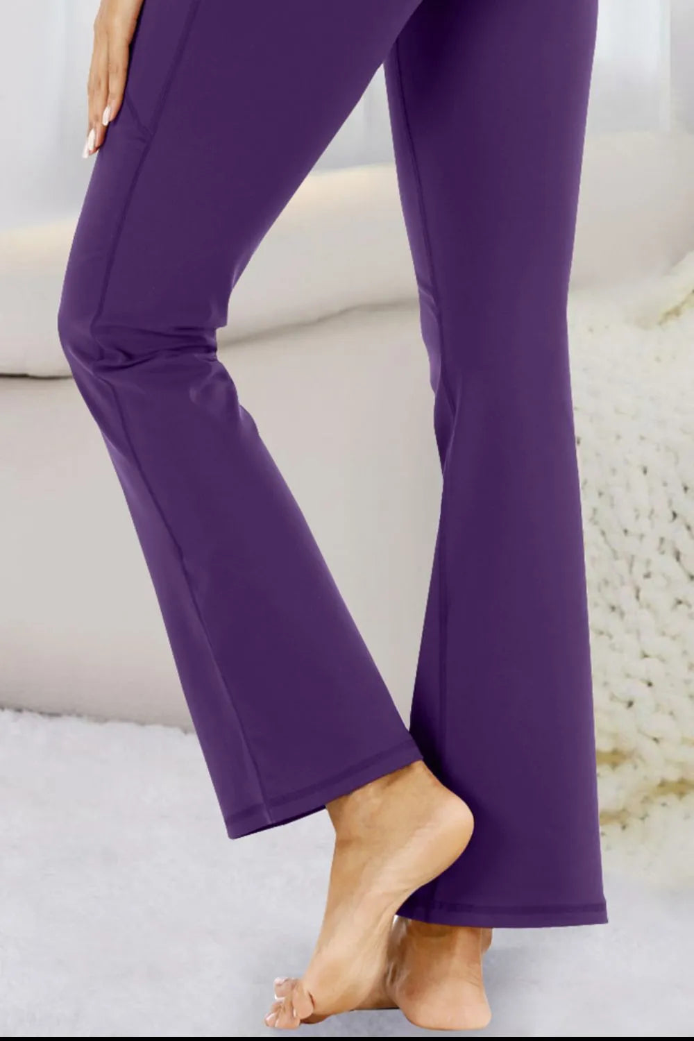 High-waisted flare yoga pants with side phone pockets