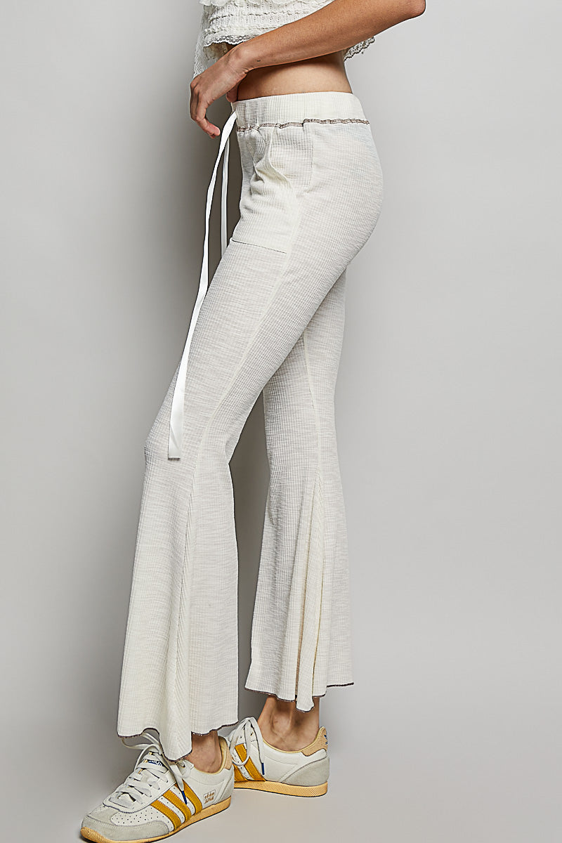 Ribbed knit flare pants with drawstring waist and patch pockets