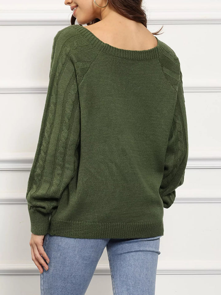 Cable knit boat neck sweater with side button trim