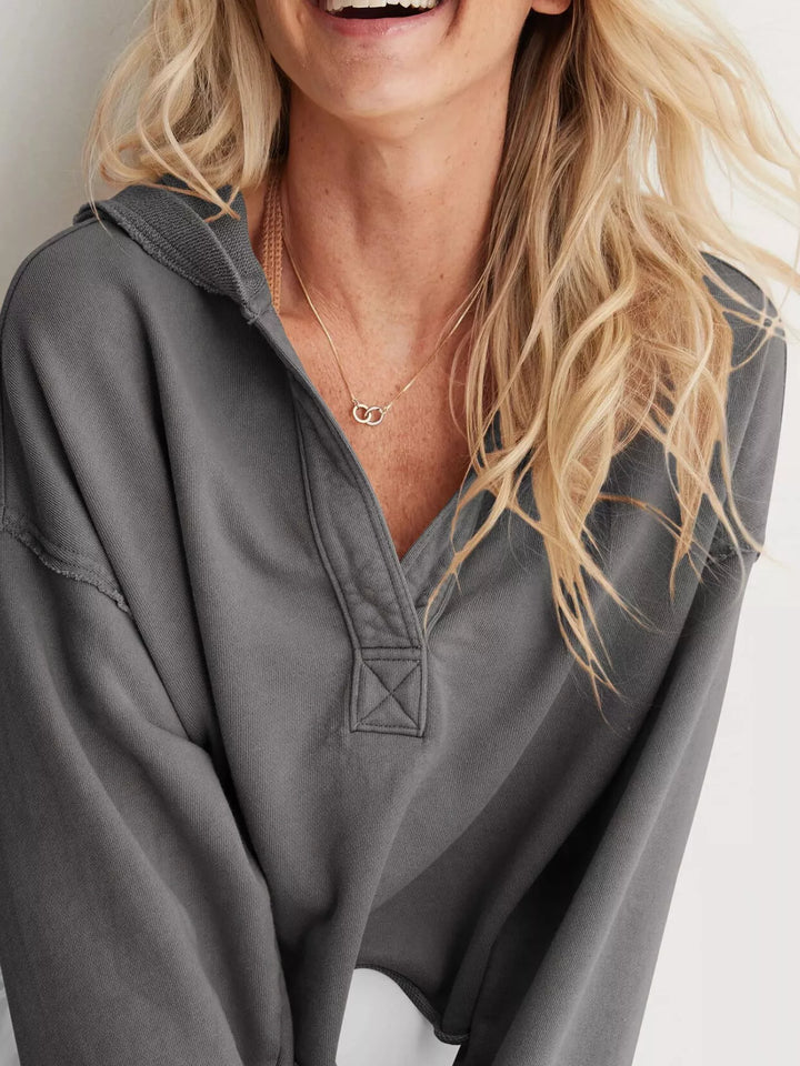 Cropped exposed-seam pullover hoodie with split neck