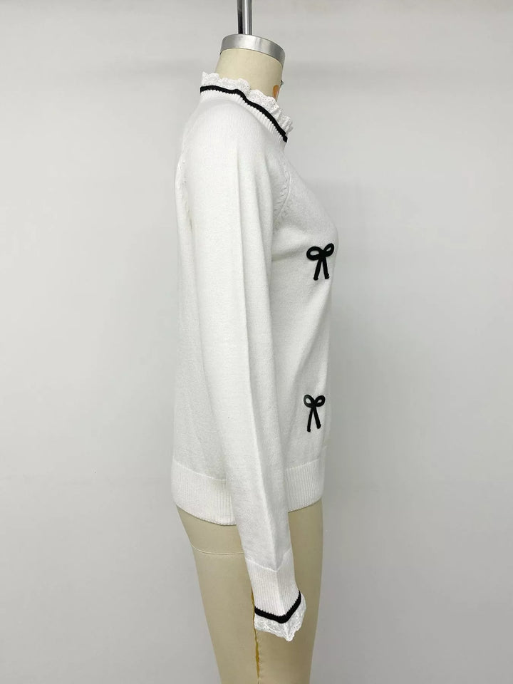 Lace trim mock neck sweater with contrast bow appliqués