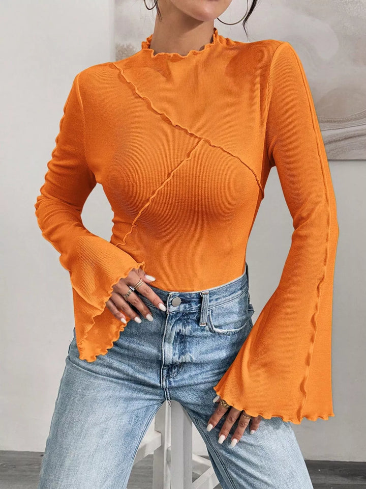 Ribbed knit mock neck top with lettuce-edge flare sleeves