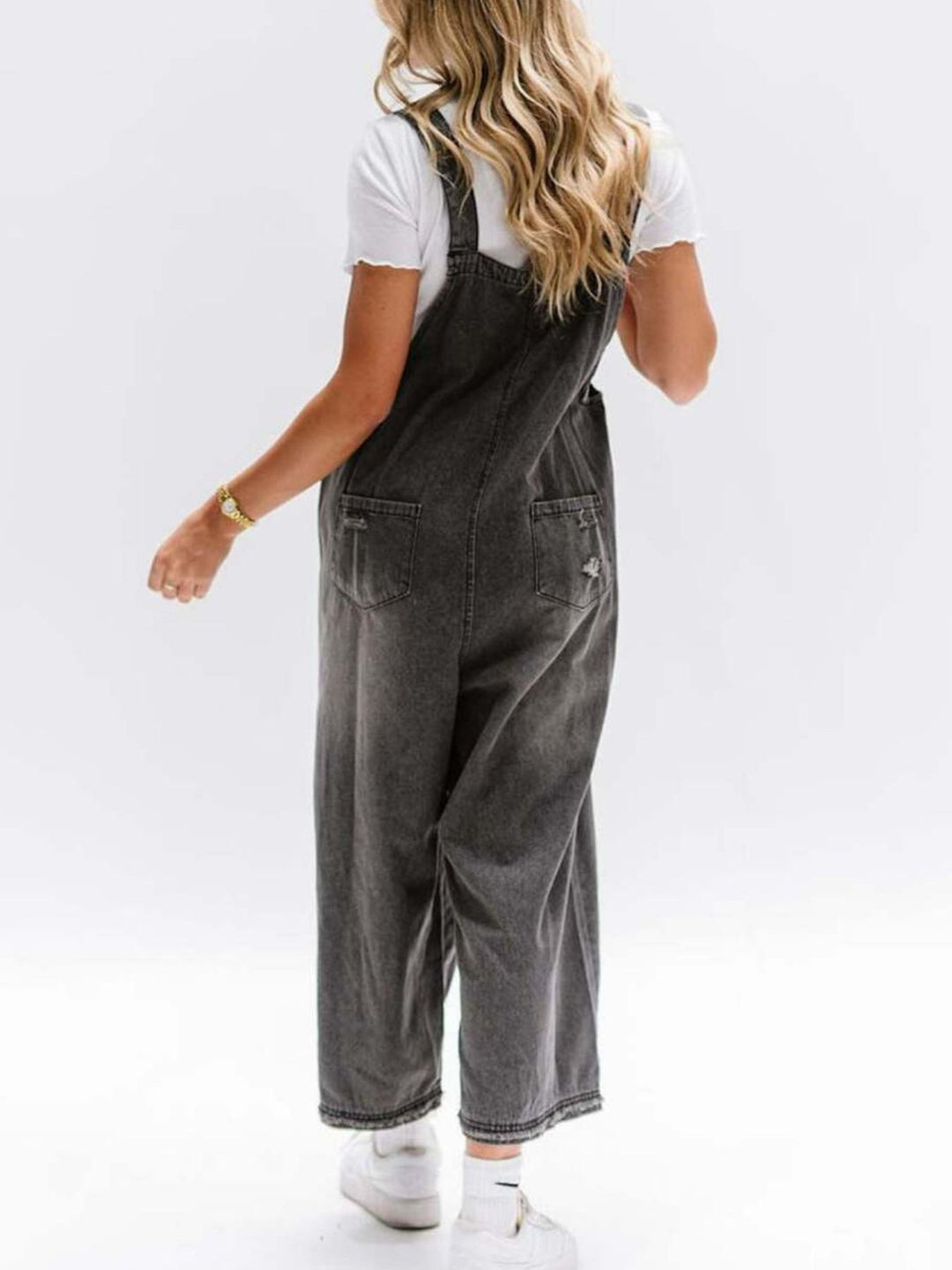 Distressed wide leg denim overalls with adjustable straps