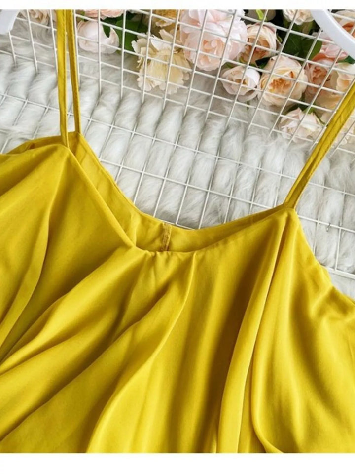 Flowy chiffon cami with ruffled hem and V-neck