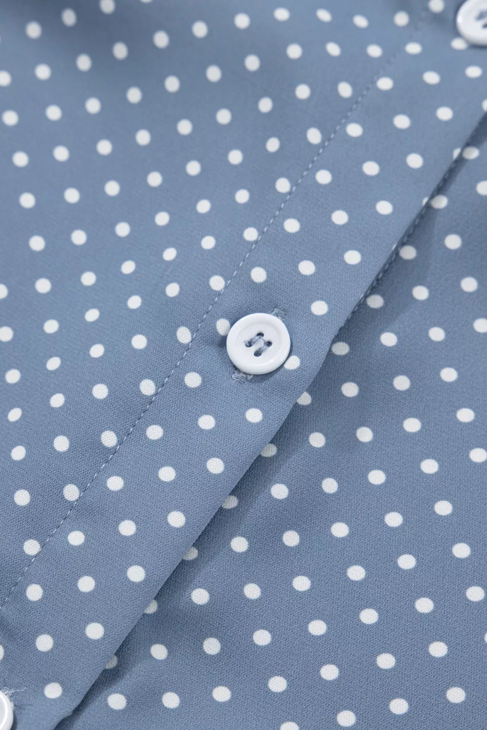 Polka dot button-down shirt with cuffed short sleeves