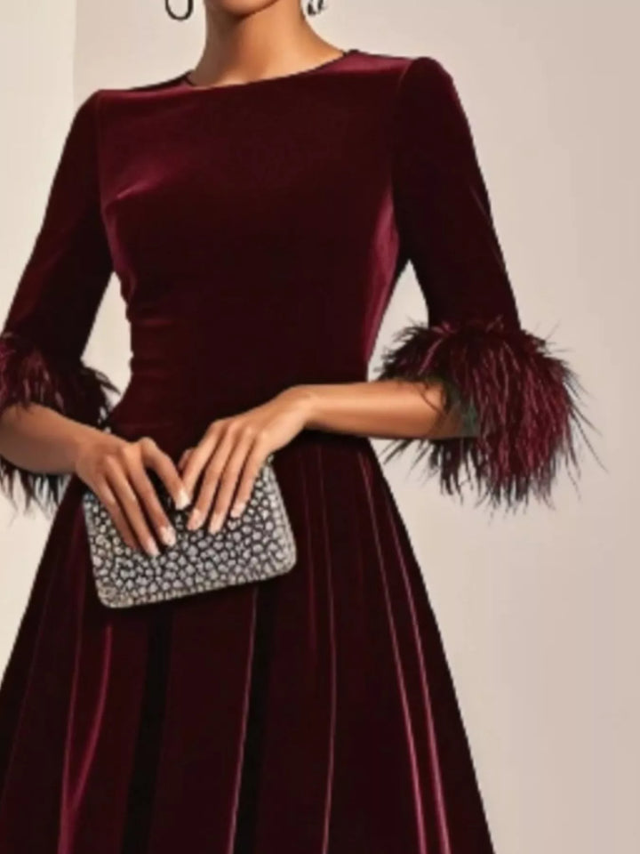 Feather cuff velvet midi dress with full A-line skirt