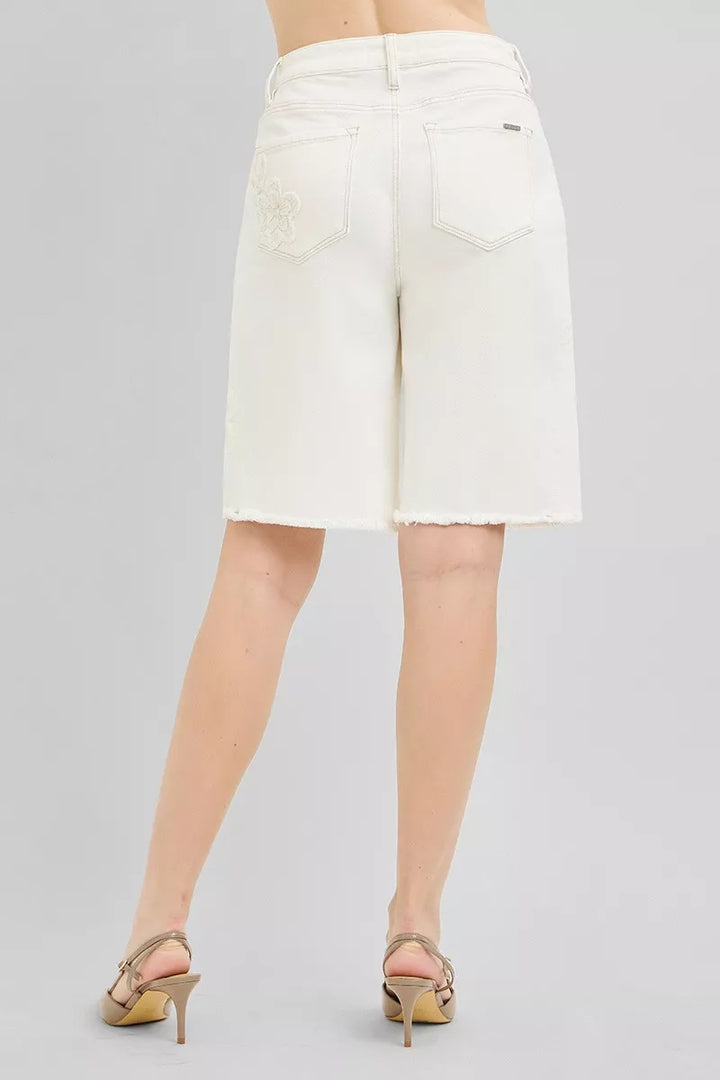 Relaxed Bermuda denim shorts with floral embroidery and raw hem