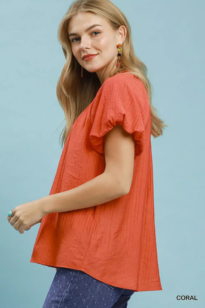 Relaxed gathered V-neck top with flutter sleeves
