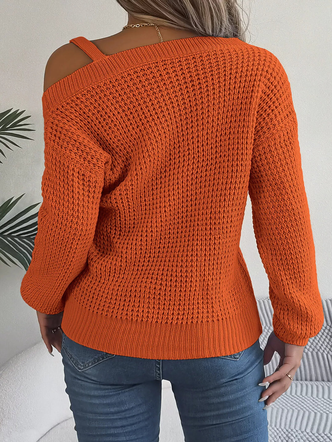 Asymmetrical cold-shoulder openwork knit sweater with chain strap