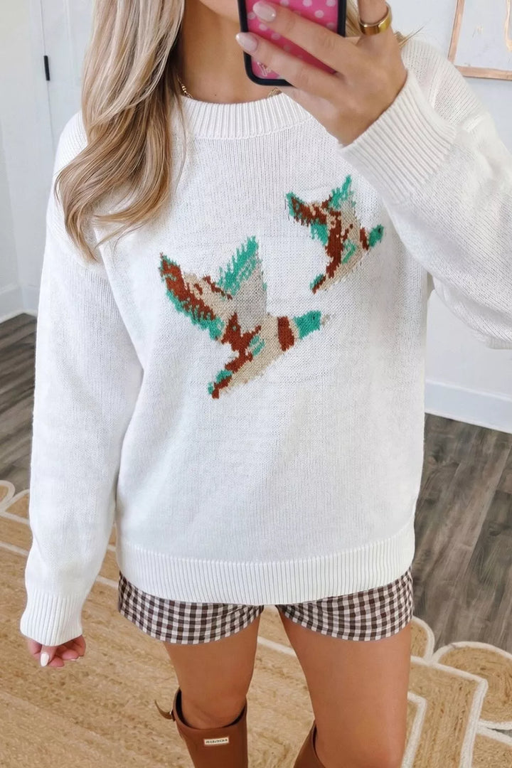 Drop shoulder crew neck sweater with knit bird graphic