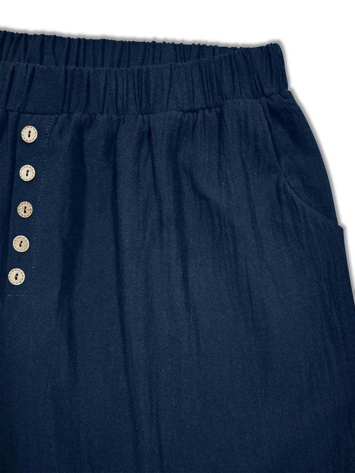 Plus-size elastic waist button-front shorts with pockets