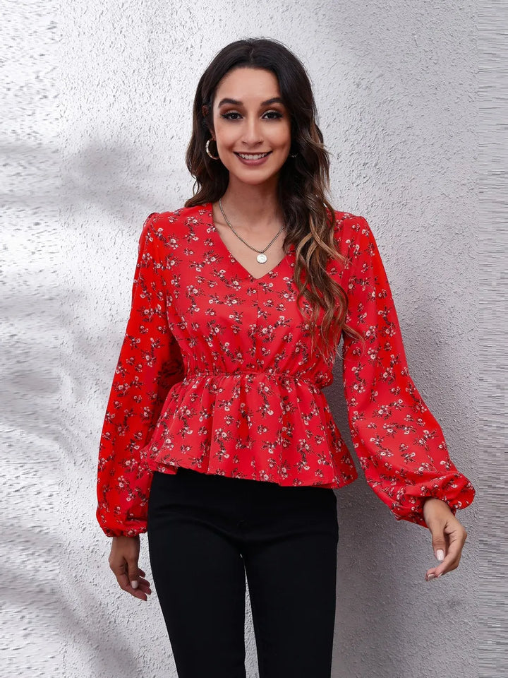 Floral peplum blouse with V-neck and balloon sleeves