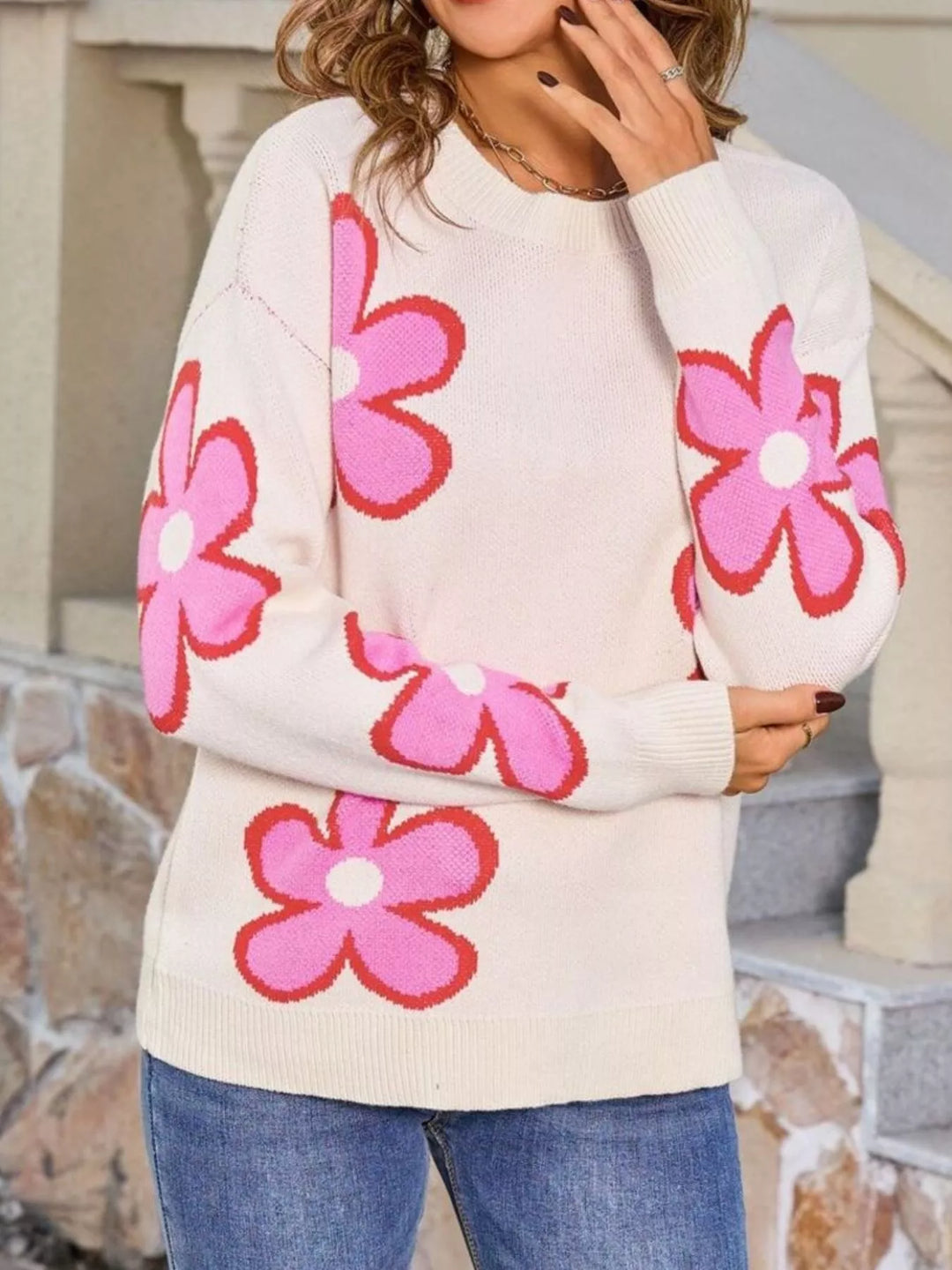Floral crew neck knit sweater with ribbed cuffs