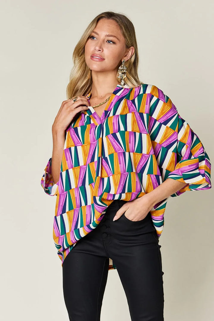 Purple Geometric print notched neck dolman sleeve top