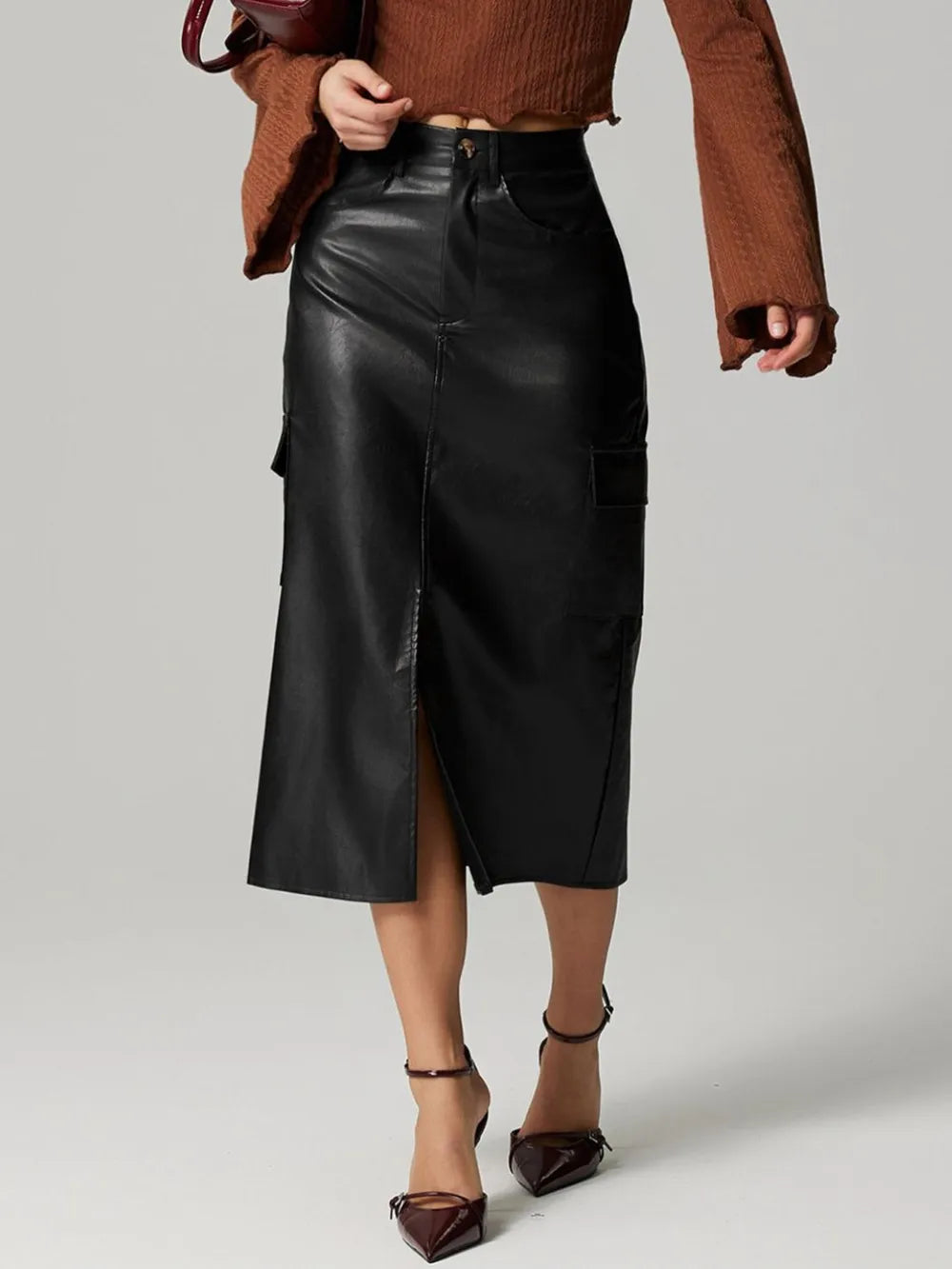 Black High-rise faux leather midi skirt with cargo pockets and slit
