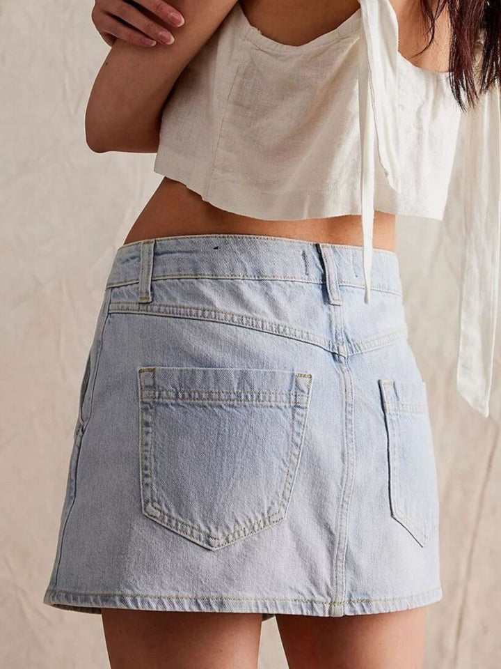 Asymmetrical button-front denim mini skirt