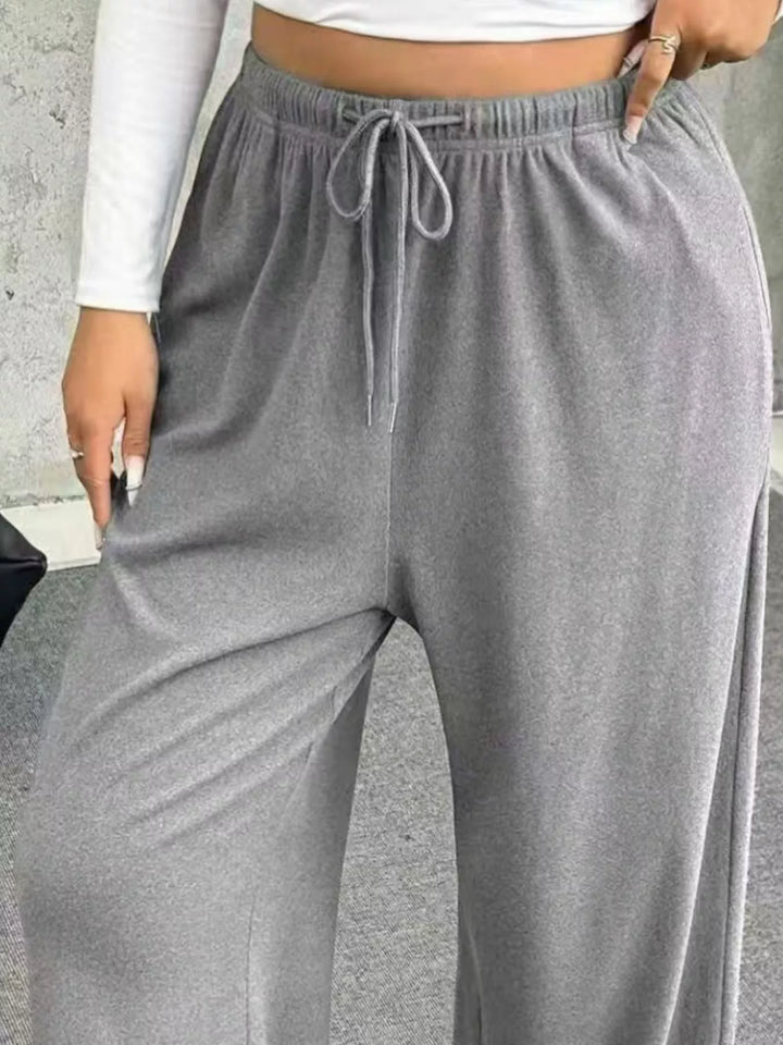 Wide-leg drawstring pants with elastic waist and pockets