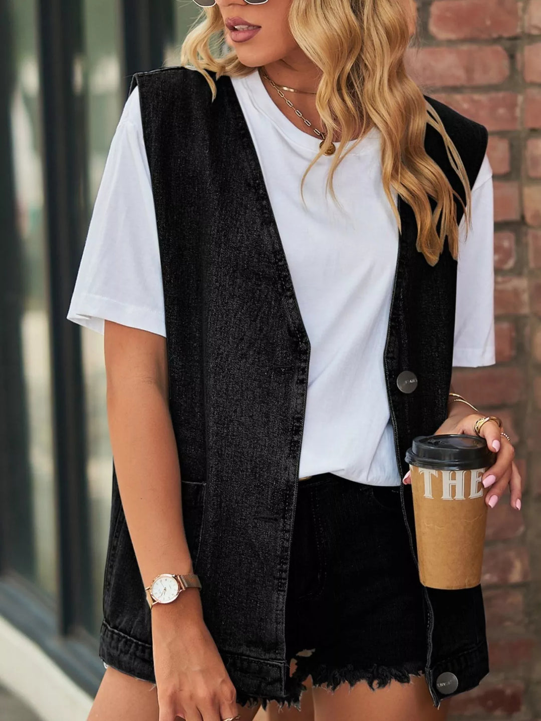 Sleeveless button-down denim vest with patch pockets