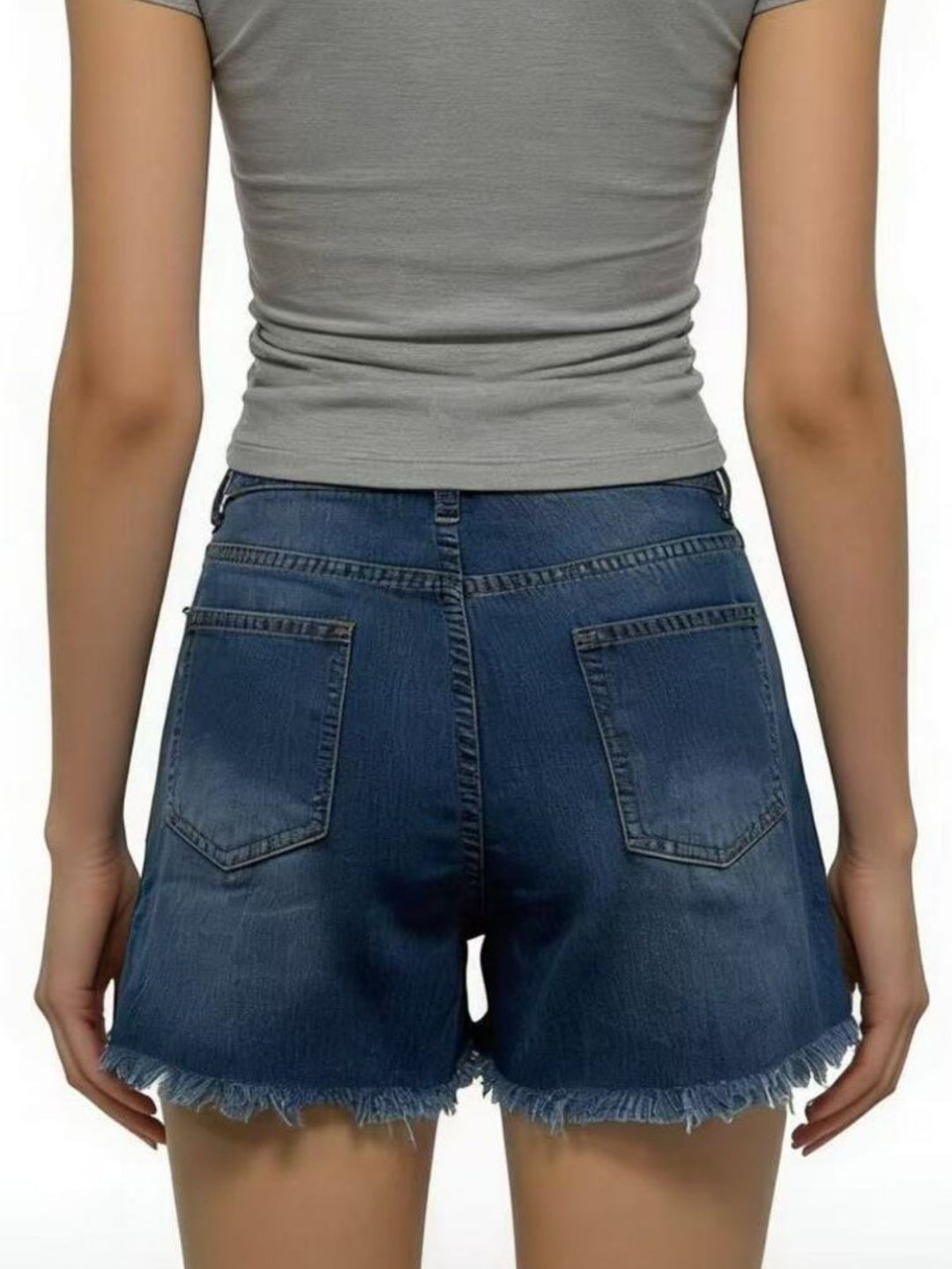 Distressed high-rise denim shorts with frayed raw hem