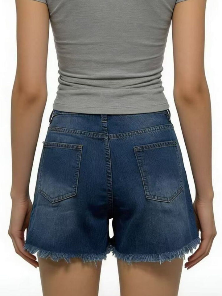Distressed high-rise denim shorts with frayed raw hem